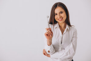 Female Dentist With Dentistry Tools Isolated - PAVON | Contabilidade em São Paulo