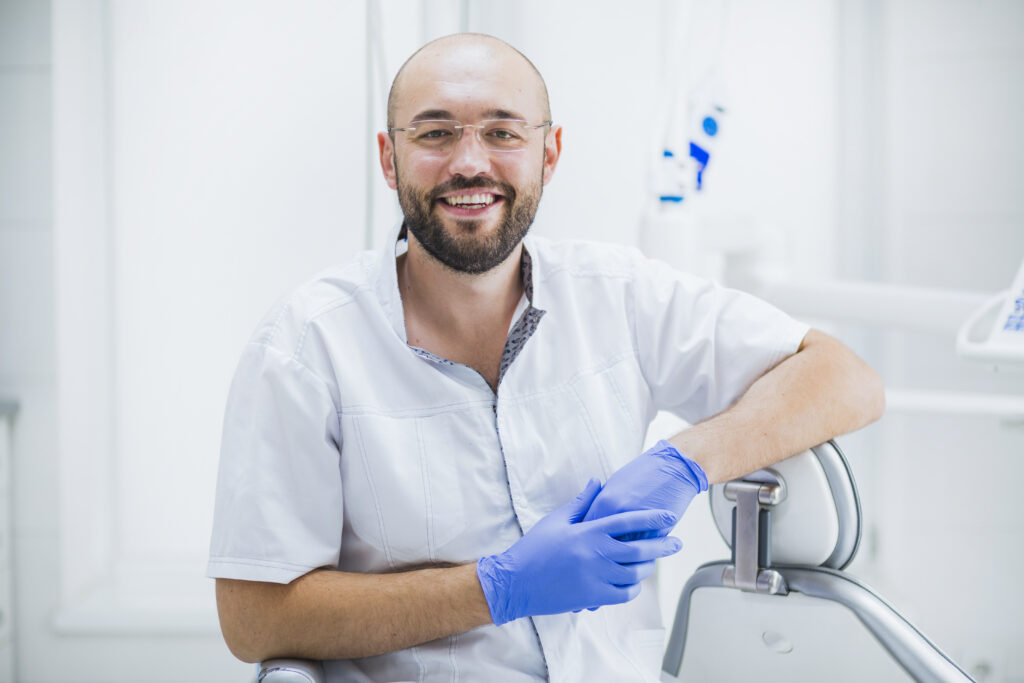 Portrait Happy Male Dentist - PAVON | Contabilidade em São Paulo