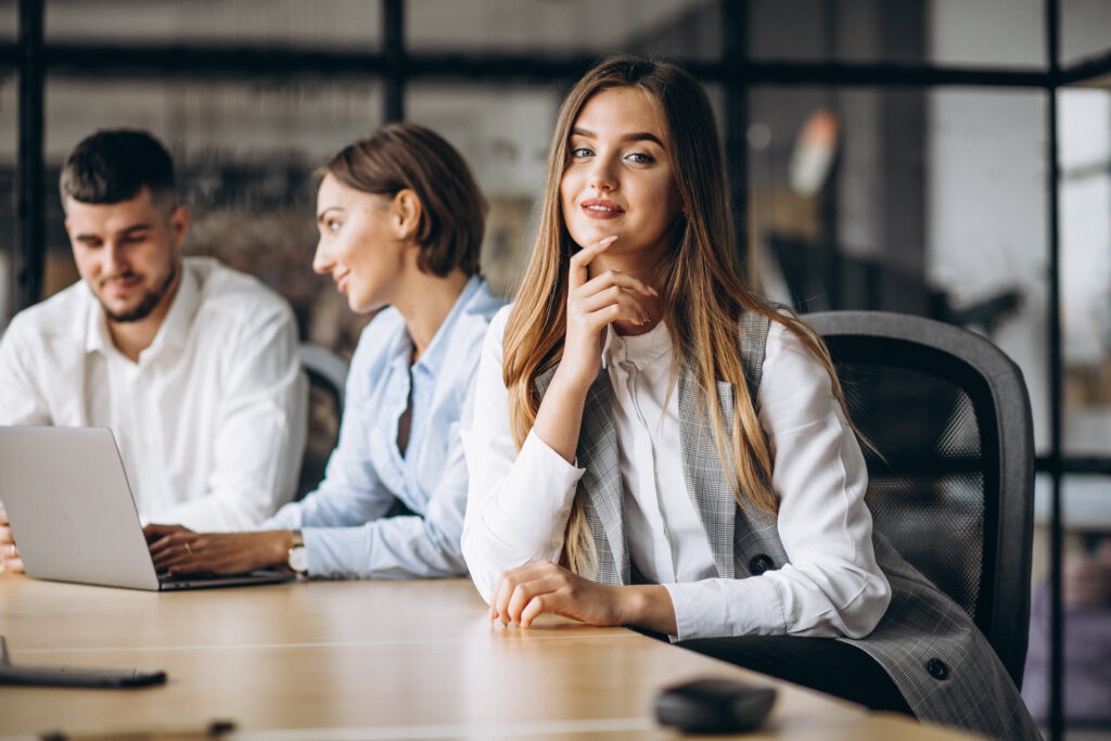 Group Of People Working Out Business Plan In An Office - PAVON | Contabilidade em São Paulo