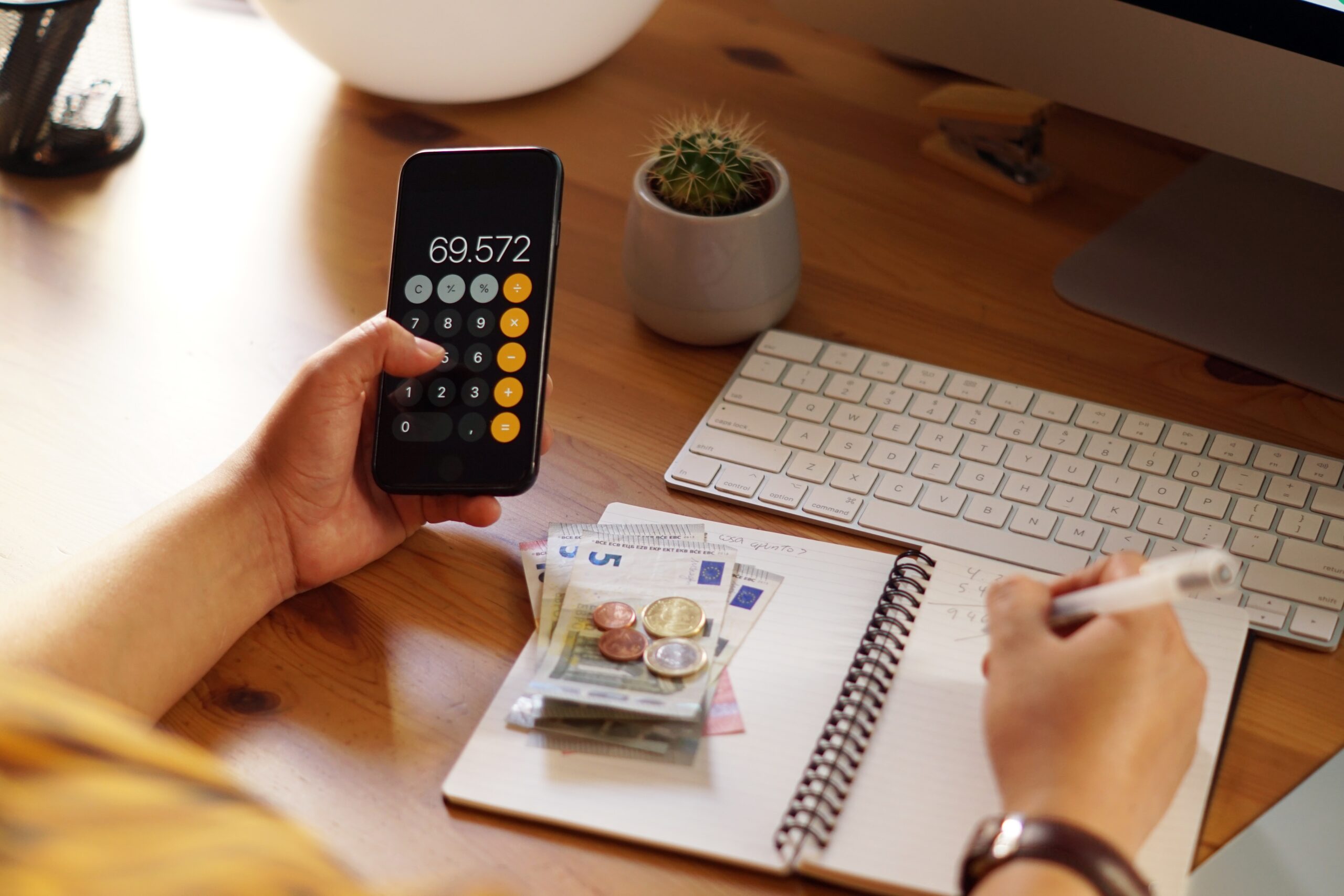Closeup Shot Of An Entrepreneur Working From Home On His Personal Finances And Savings - PAVON | Contabilidade em São Paulo