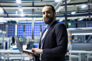 Solar Panel Industry Expert Stands In A High Tech Facility For Inspection - PAVON | Contabilidade em São Paulo