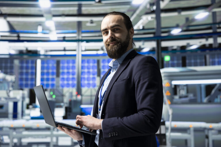 Solar Panel Industry Expert Stands In A High Tech Facility For Inspection - PAVON | Contabilidade em São Paulo