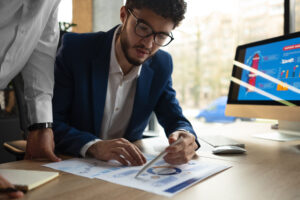People Analyzing Checking Finance Graphs Office - PAVON | Contabilidade em São Paulo